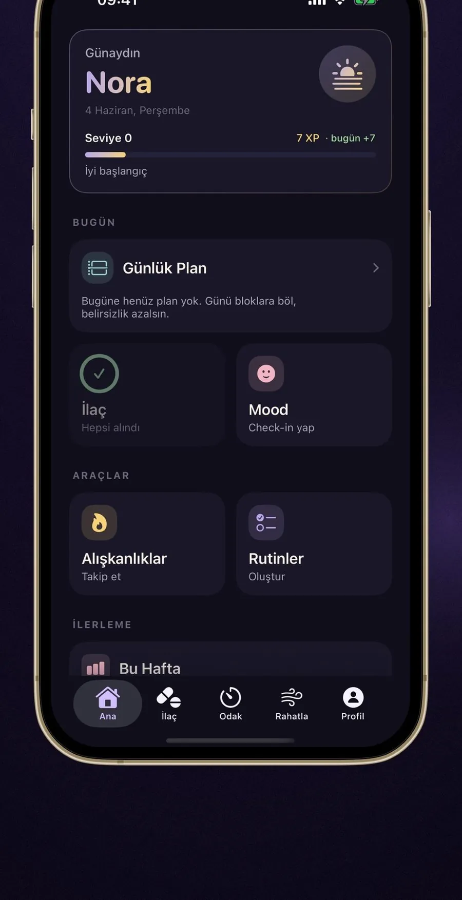 Nöra bir iPhone’da günlük planı, ilaç durumunu ve duygu kaydını gösteriyor.